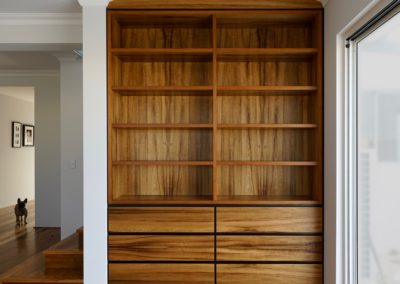 built in bookcase with drawers